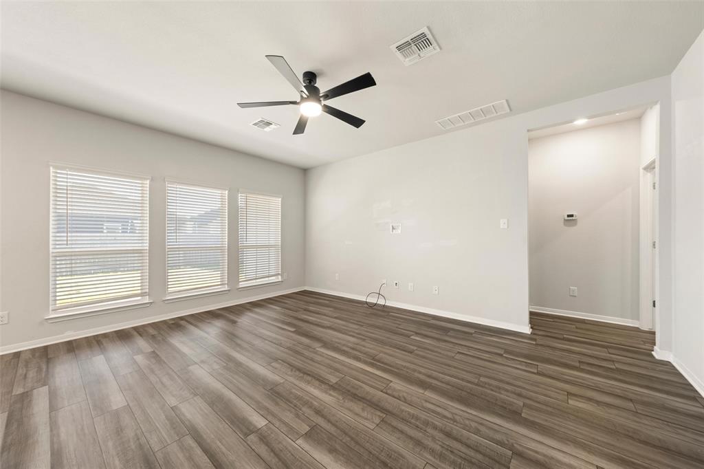 11304 Solar Street Lorena, TX 76655 - Photo 9 of 34 Spare room with dark wood-type flooring, ceiling fan, and recessed lighting