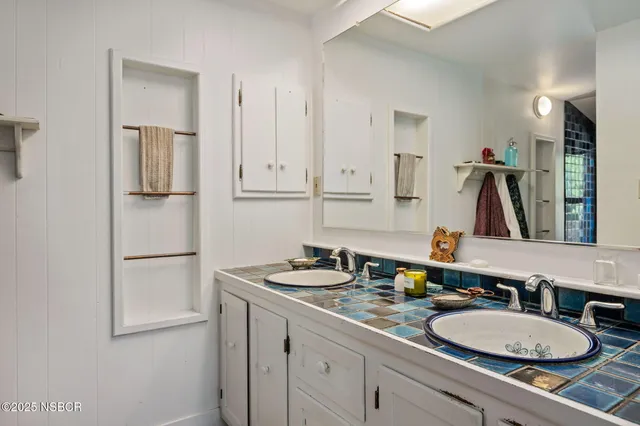 a room with a black white checkered floor with a black white checkered floor
