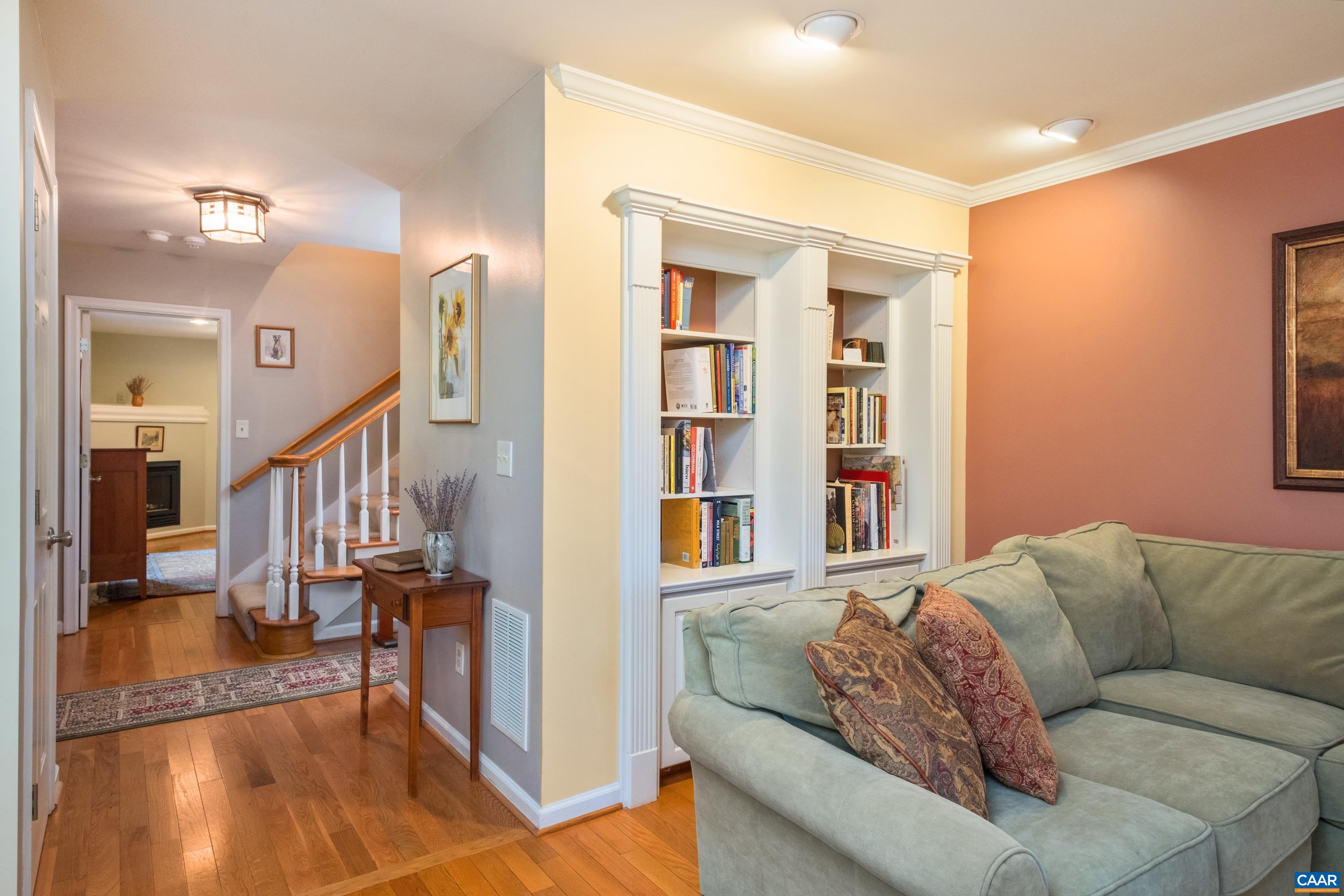 4375 Taylor Creek Road Afton, VA 22920 - Photo 20 of 75 a living room with furniture and a book shelf