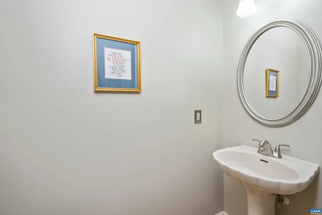 a view of a livingroom with closet and cabinet