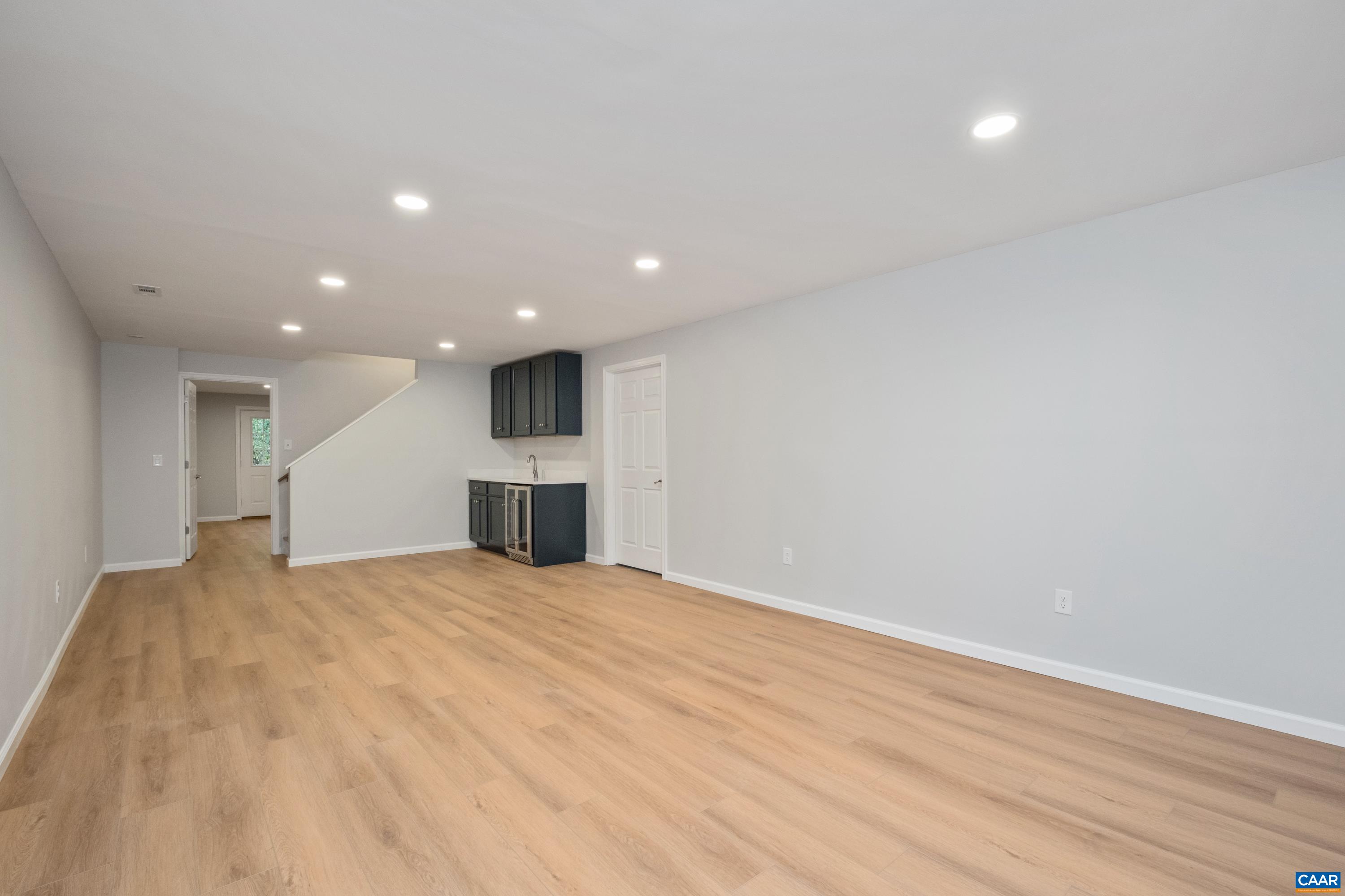 4375 Taylor Creek Road Afton, VA 22920 - Photo 49 of 75 a view of empty room with wooden floor and fireplace