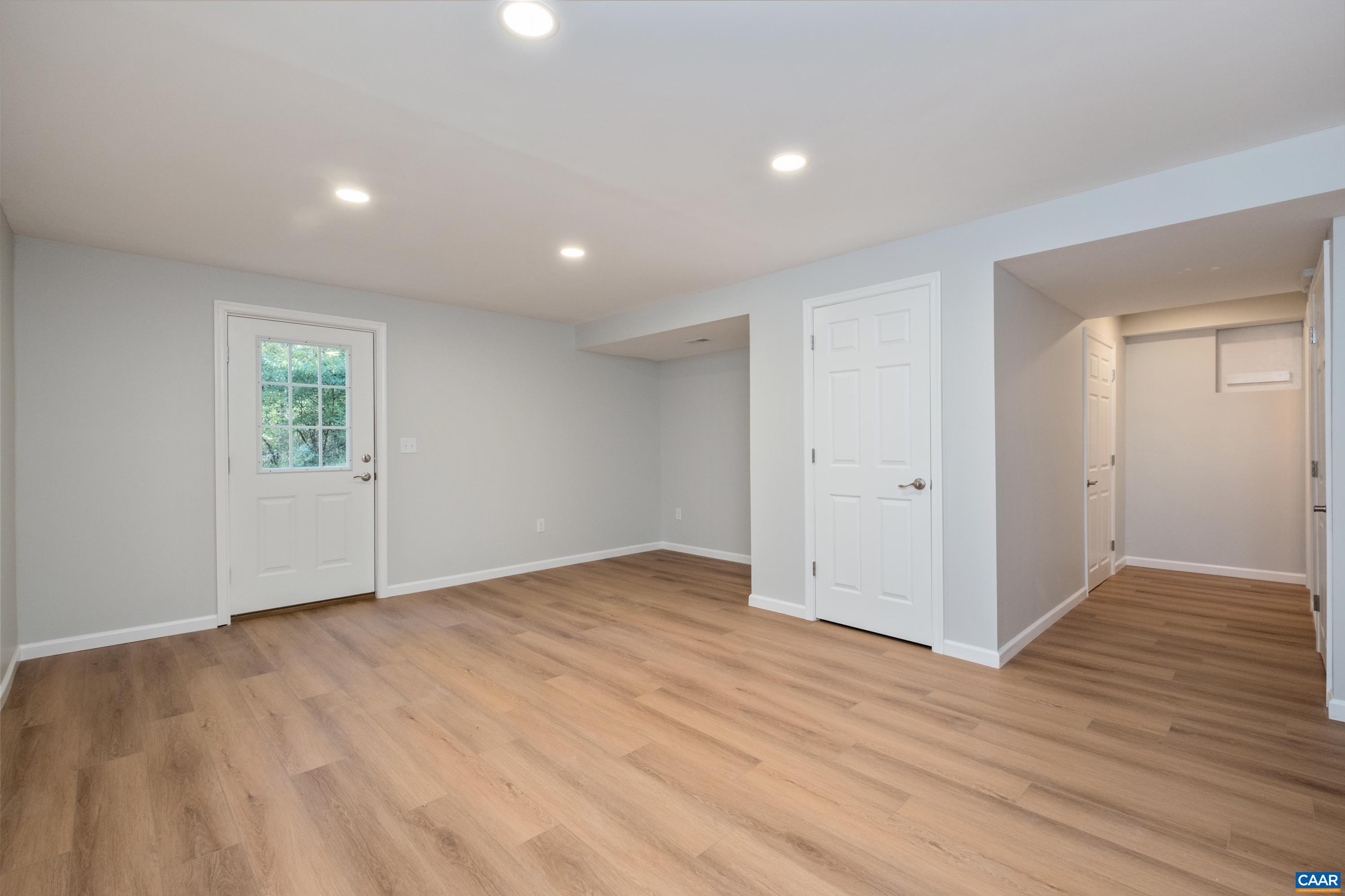 4375 Taylor Creek Road Afton, VA 22920 - Photo 53 of 75 a view of an empty room with wooden floor and closet