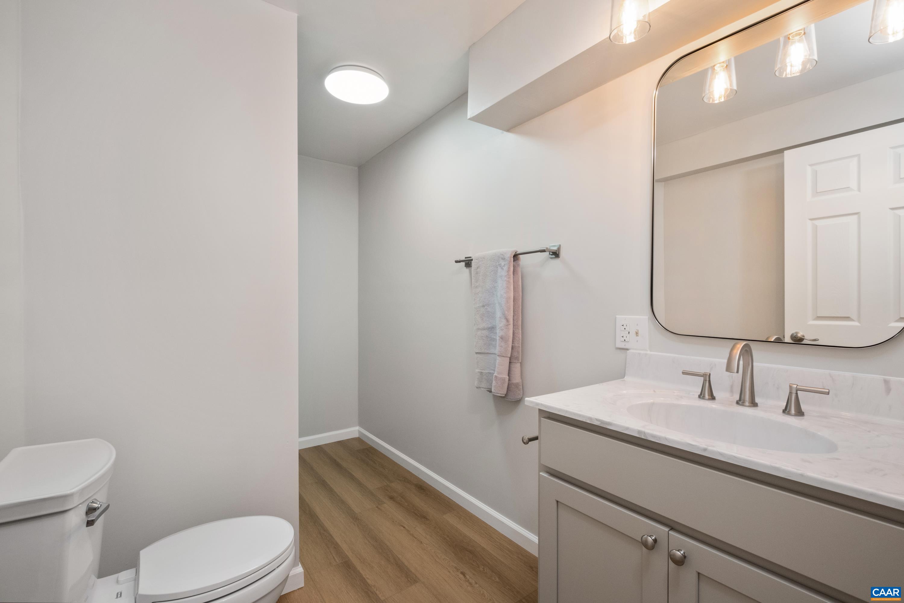 4375 Taylor Creek Road Afton, VA 22920 - Photo 54 of 75 a bathroom with a sink toilet vanity and shower