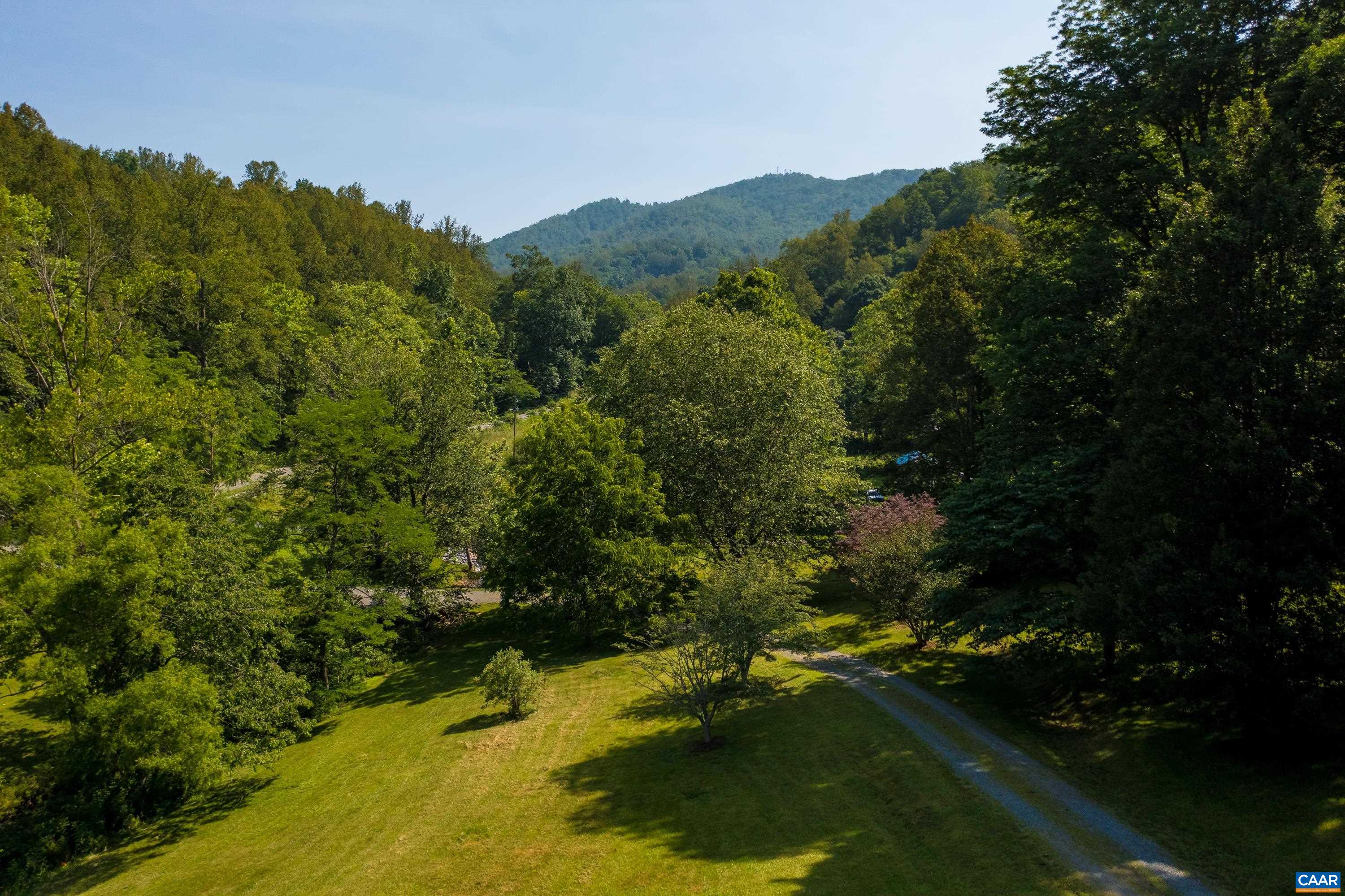 4375 Taylor Creek Road Afton, VA 22920 - Photo 75 of 75 a view of a lake with a mountain in the background