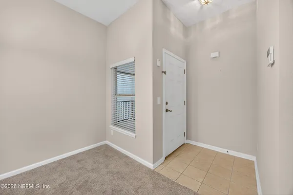 an empty room with windows