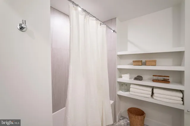 a view of a closet in a room