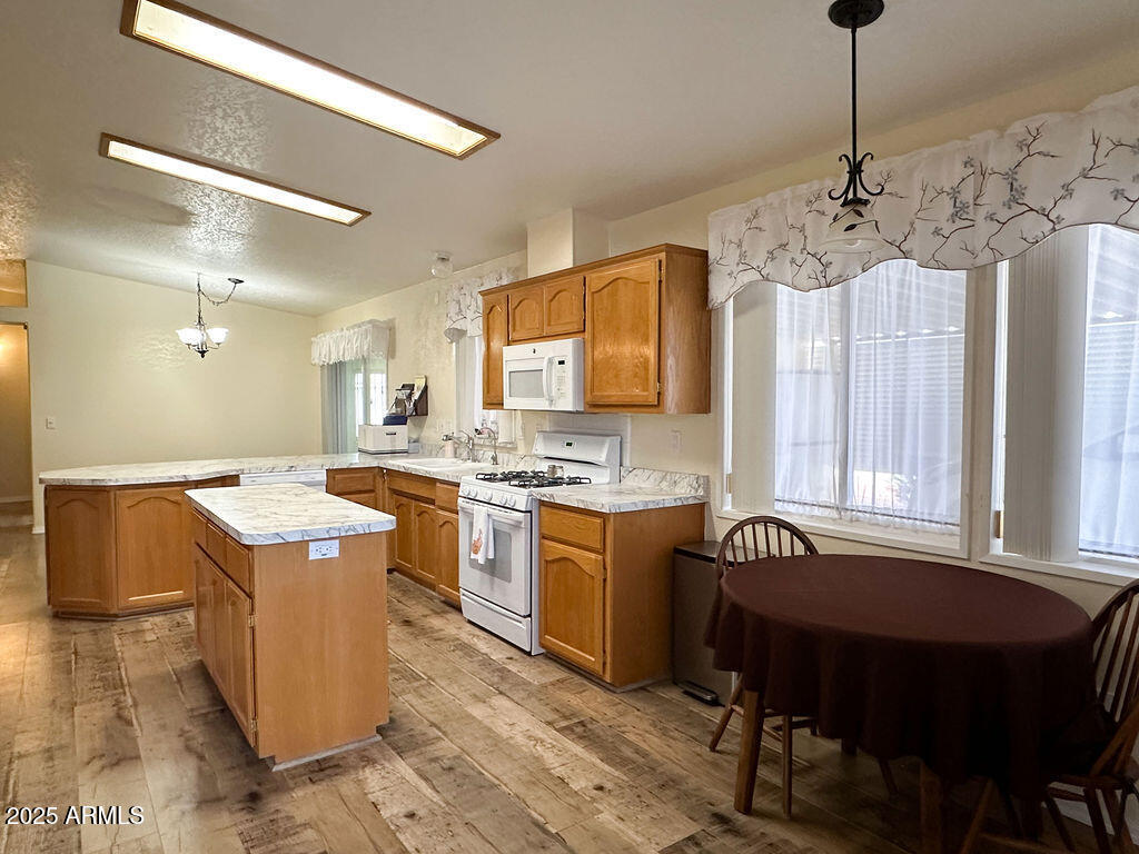 2054 North Thornton Road, Unit 140 Casa Grande, AZ 85122 - Photo 10 of 16 a kitchen that has a cabinets counter space and appliances