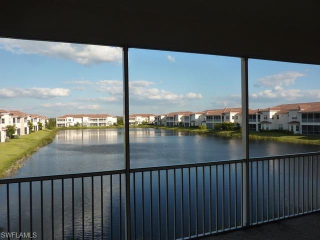 3550 Lansing Loop, Unit 201 Estero, FL 33928 - Photo 2 of 8 a view of lake from balcony