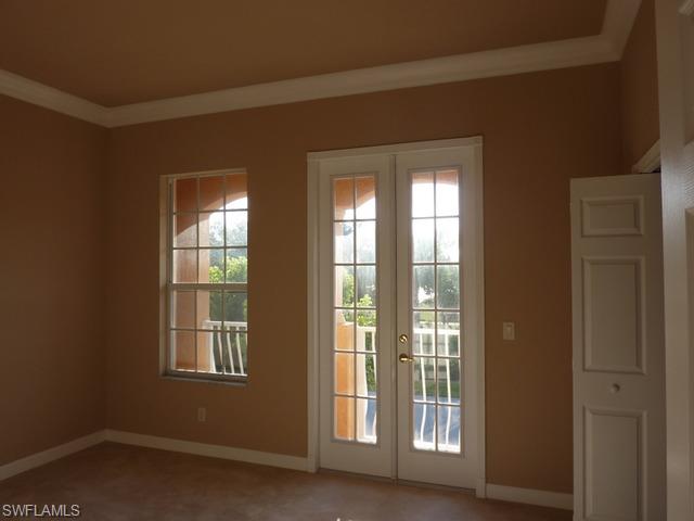 3550 Lansing Loop, Unit 201 Estero, FL 33928 - Photo 7 of 8 a view of an empty room with a window
