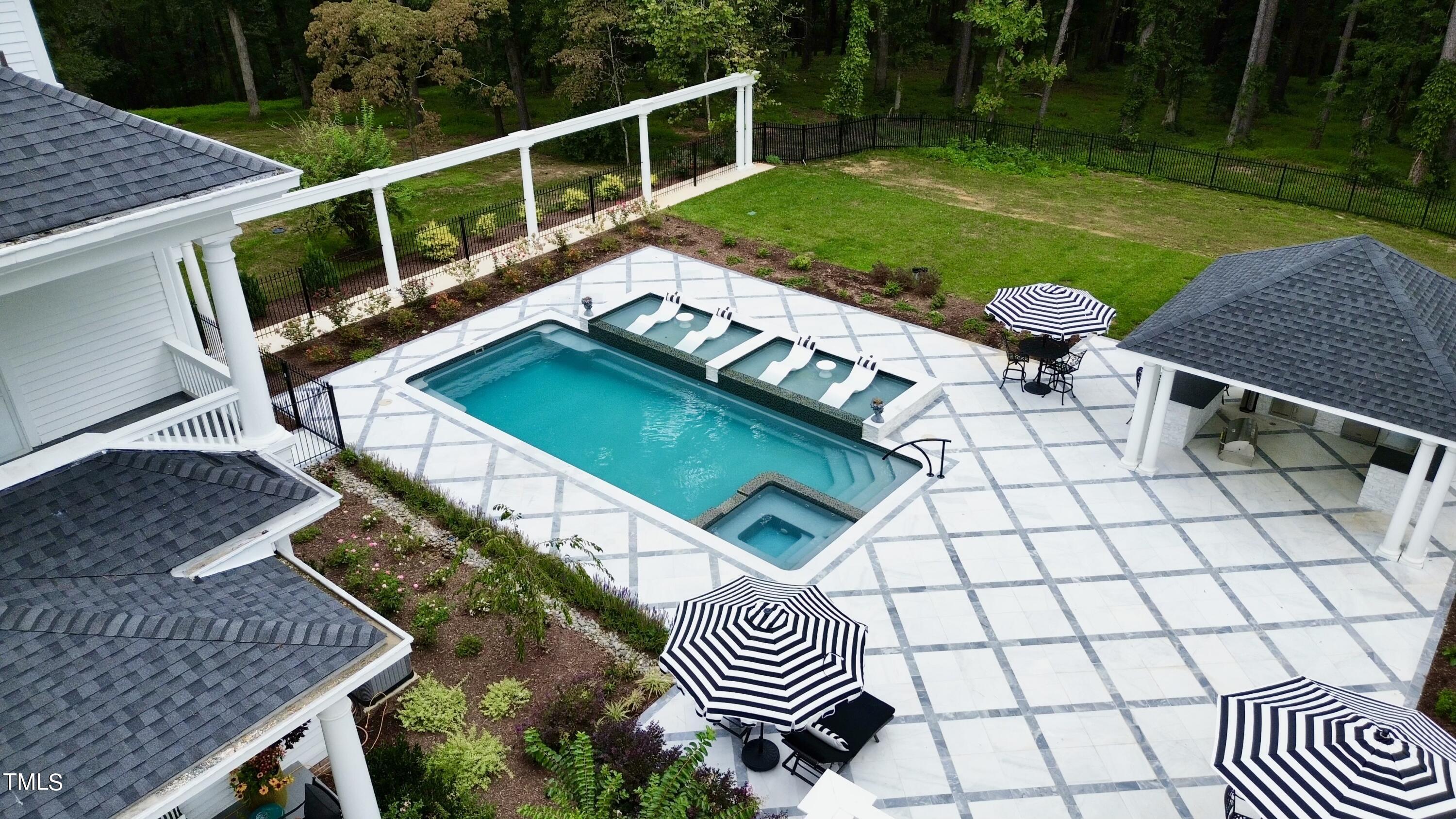 6321 Johnson Pond Road Fuquay-Varina, NC 27526 - Photo 14 of 50 a view of a backyard with sitting area