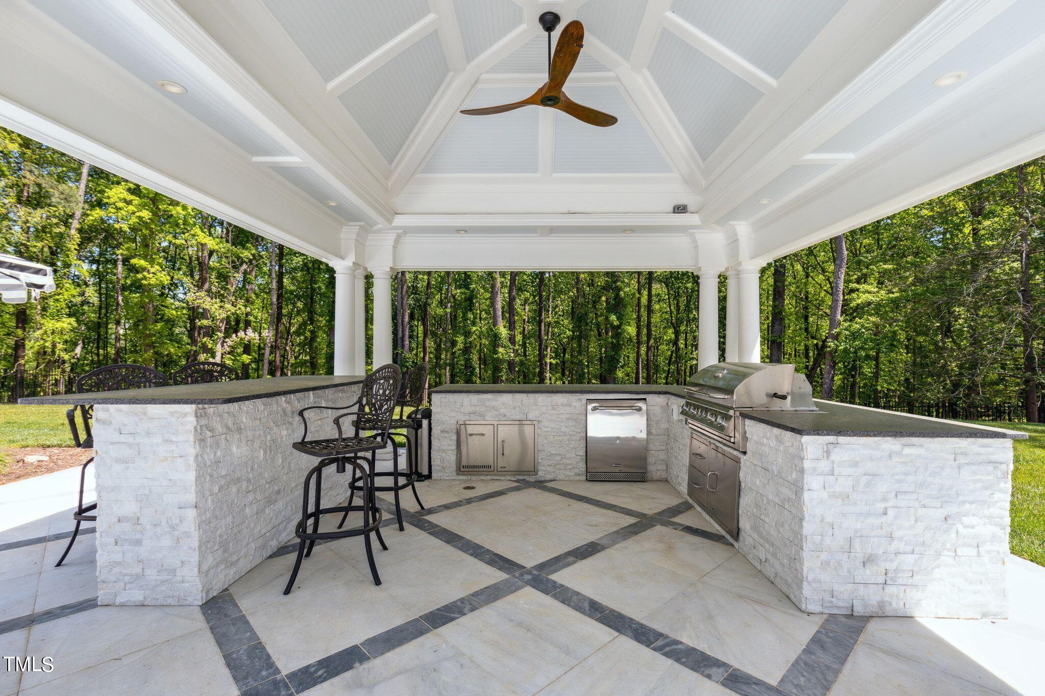 6321 Johnson Pond Road Fuquay-Varina, NC 27526 - Photo 15 of 50 a kitchen with table and chairs