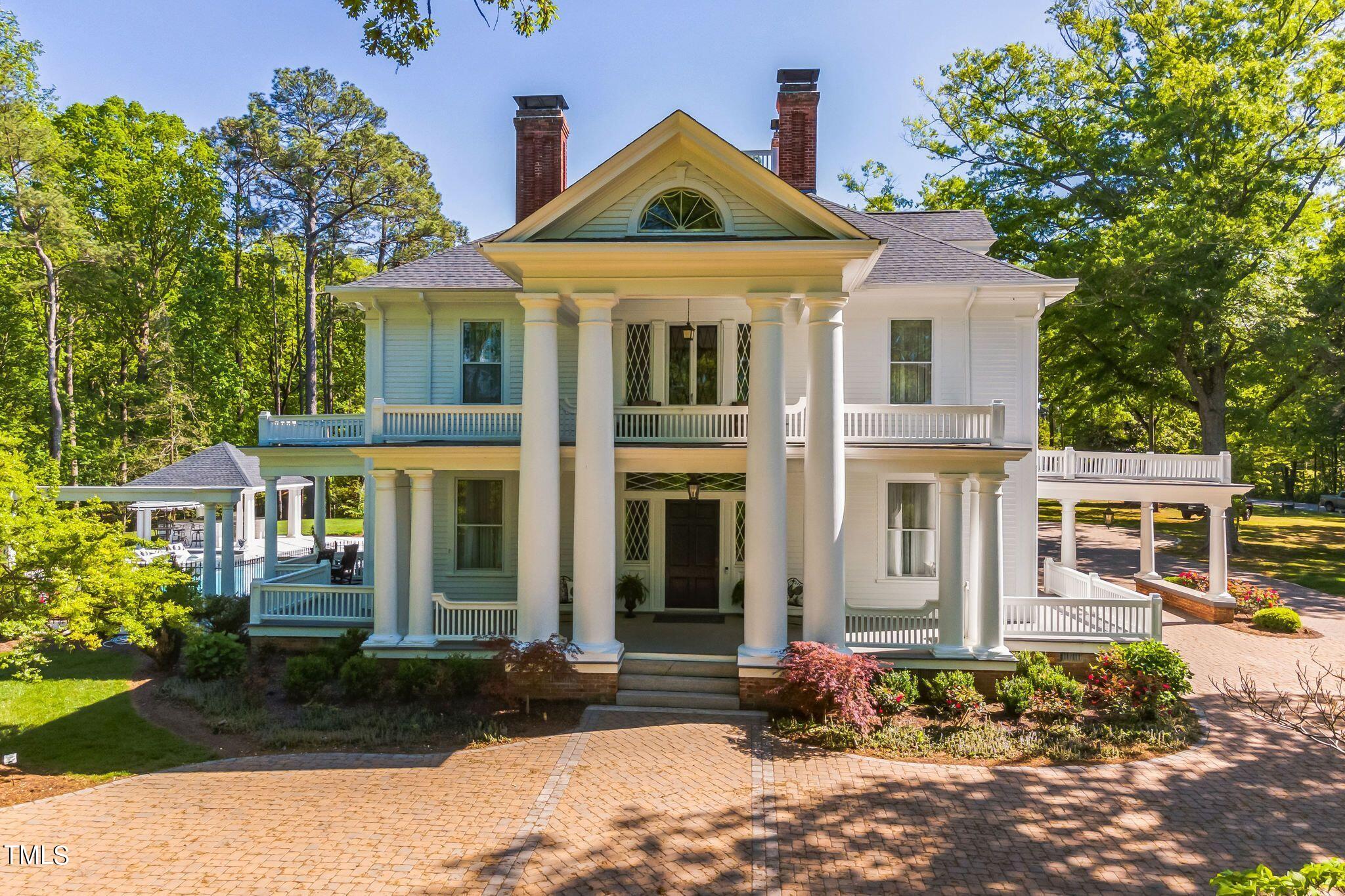 6321 Johnson Pond Road Fuquay-Varina, NC 27526 - Photo 2 of 50 front view of a house with a yard