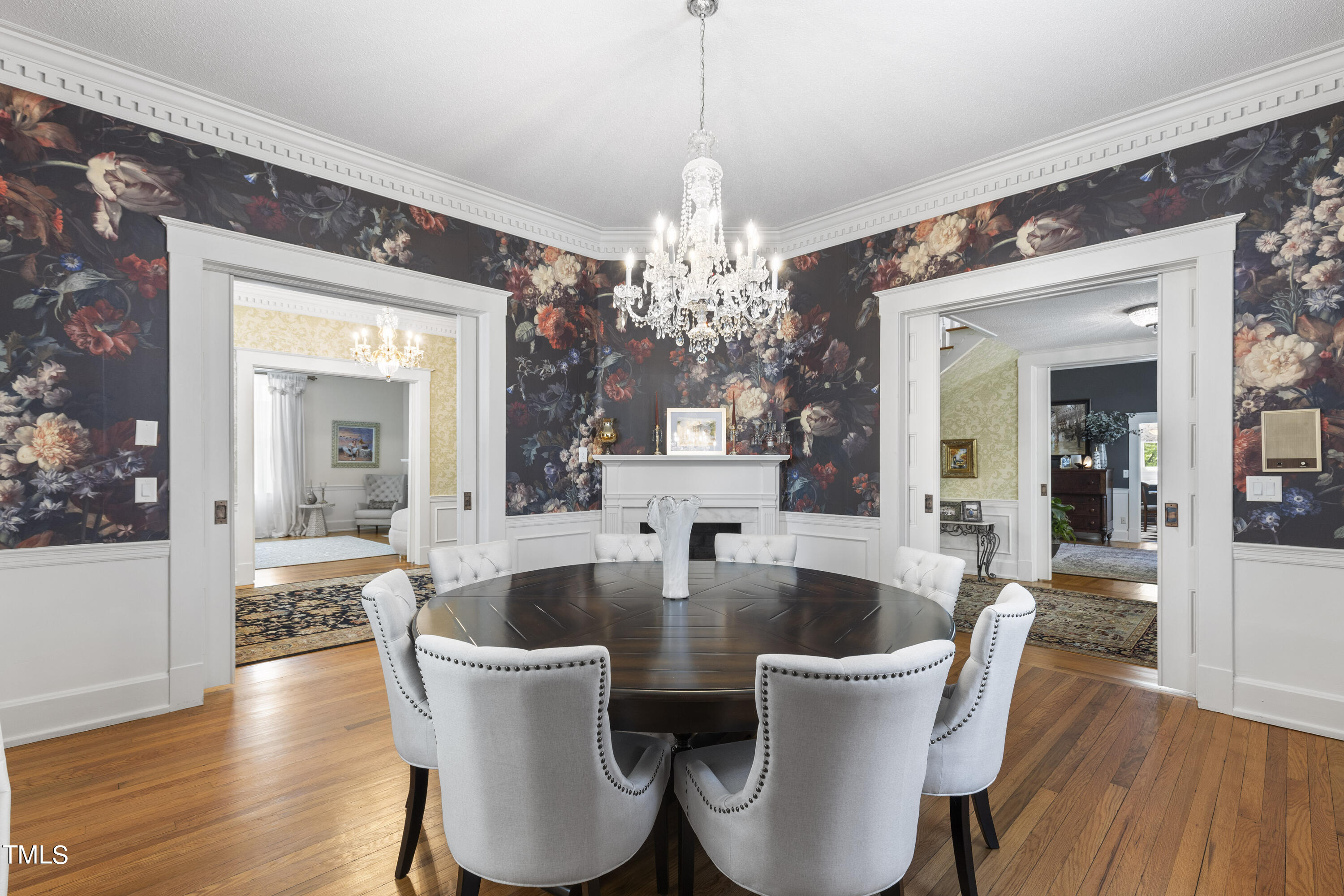 6321 Johnson Pond Road Fuquay-Varina, NC 27526 - Photo 21 of 50 a dining room with wooden floor and large windows