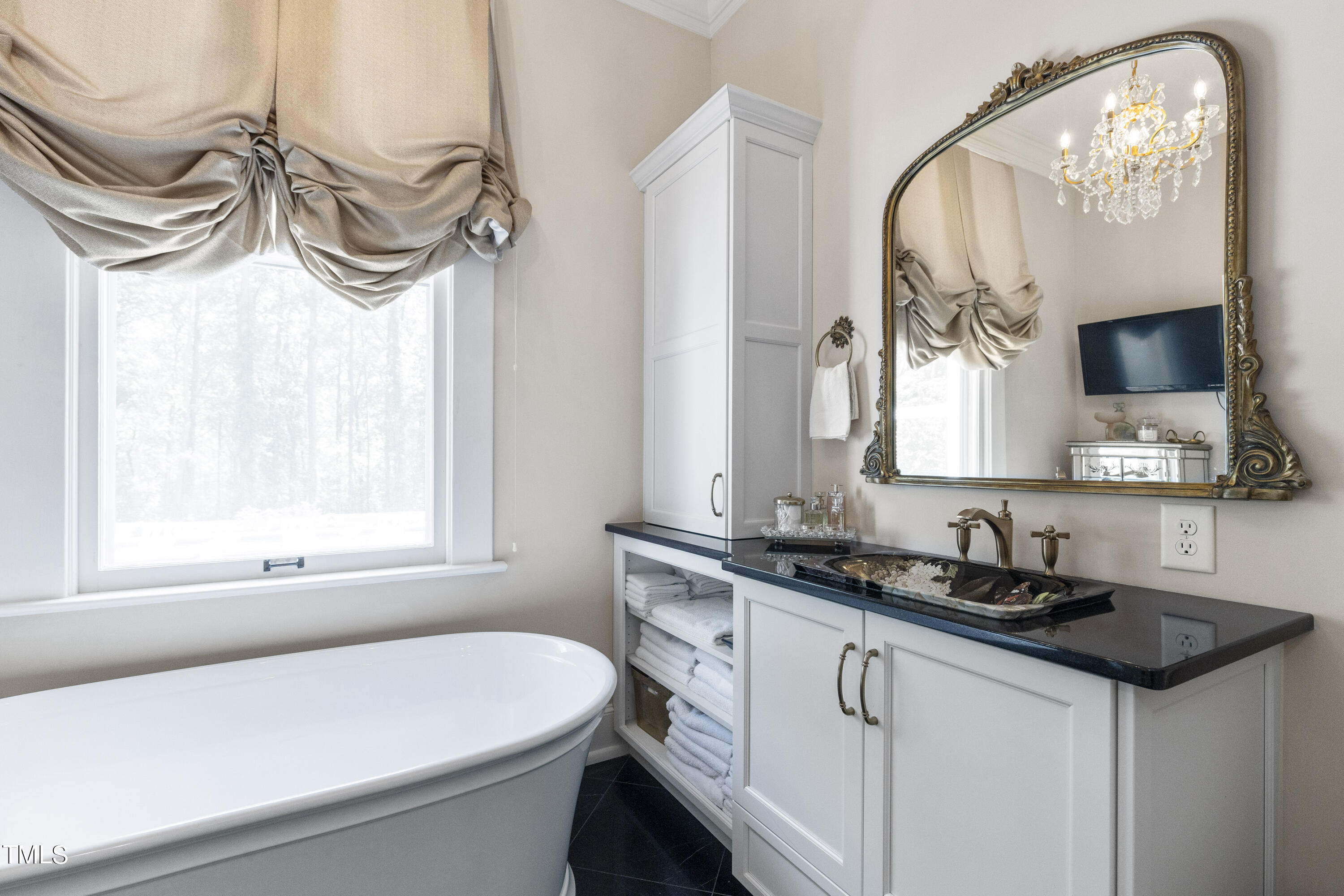 6321 Johnson Pond Road Fuquay-Varina, NC 27526 - Photo 26 of 50 a bathroom with a sink a vanity and a mirror