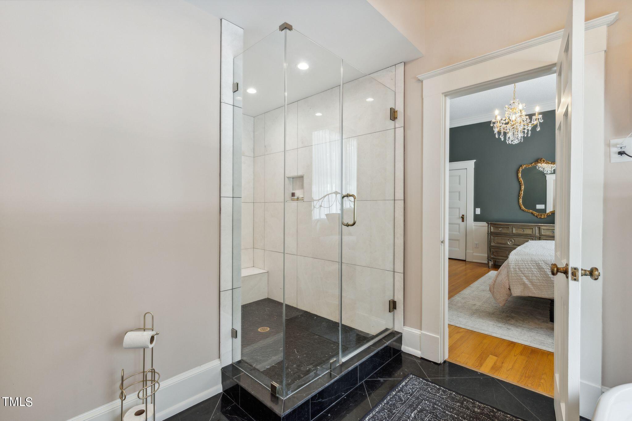 6321 Johnson Pond Road Fuquay-Varina, NC 27526 - Photo 27 of 50 a bathroom with a tub and shower