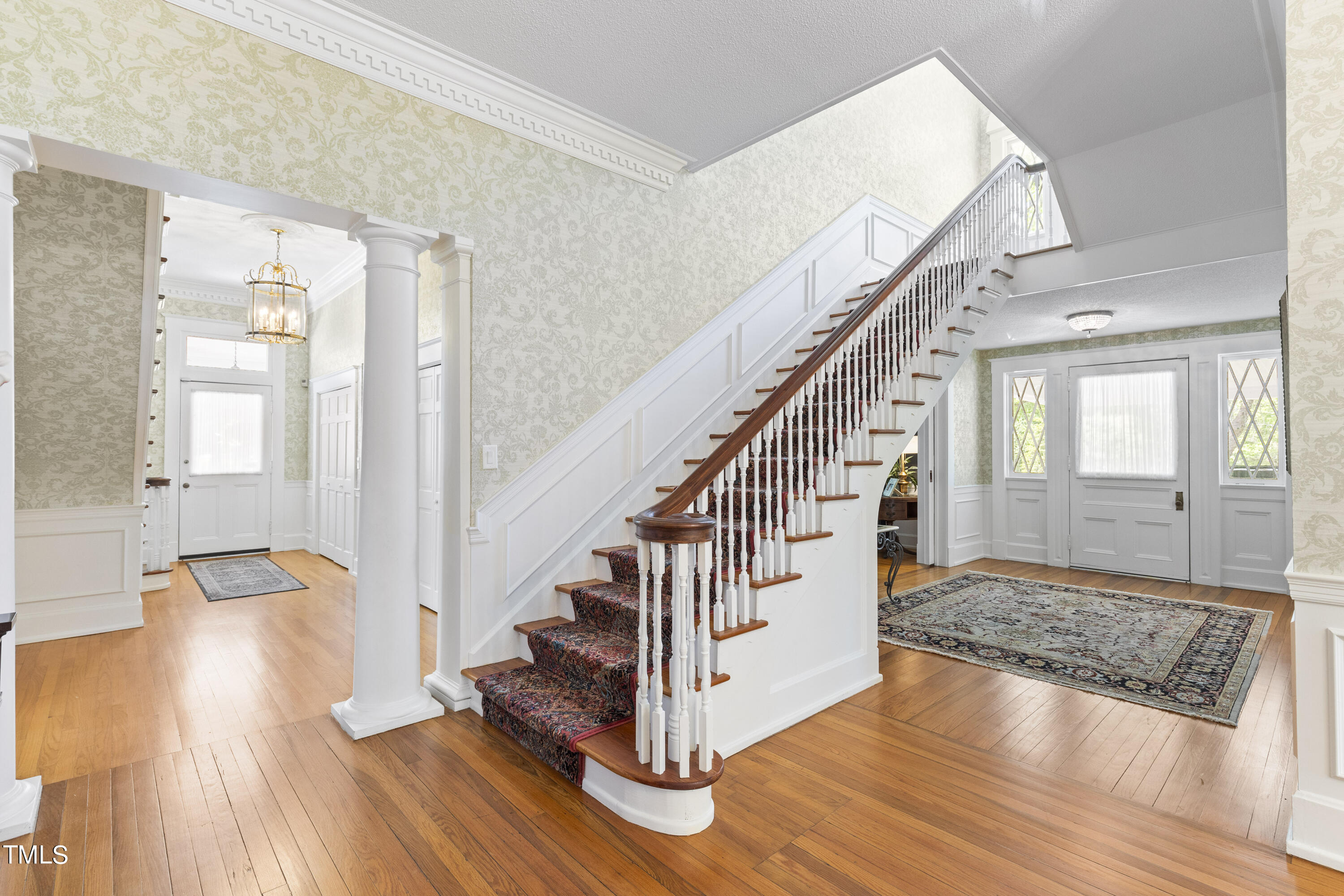 6321 Johnson Pond Road Fuquay-Varina, NC 27526 - Photo 30 of 50 a view of entryway and hall with wooden floor