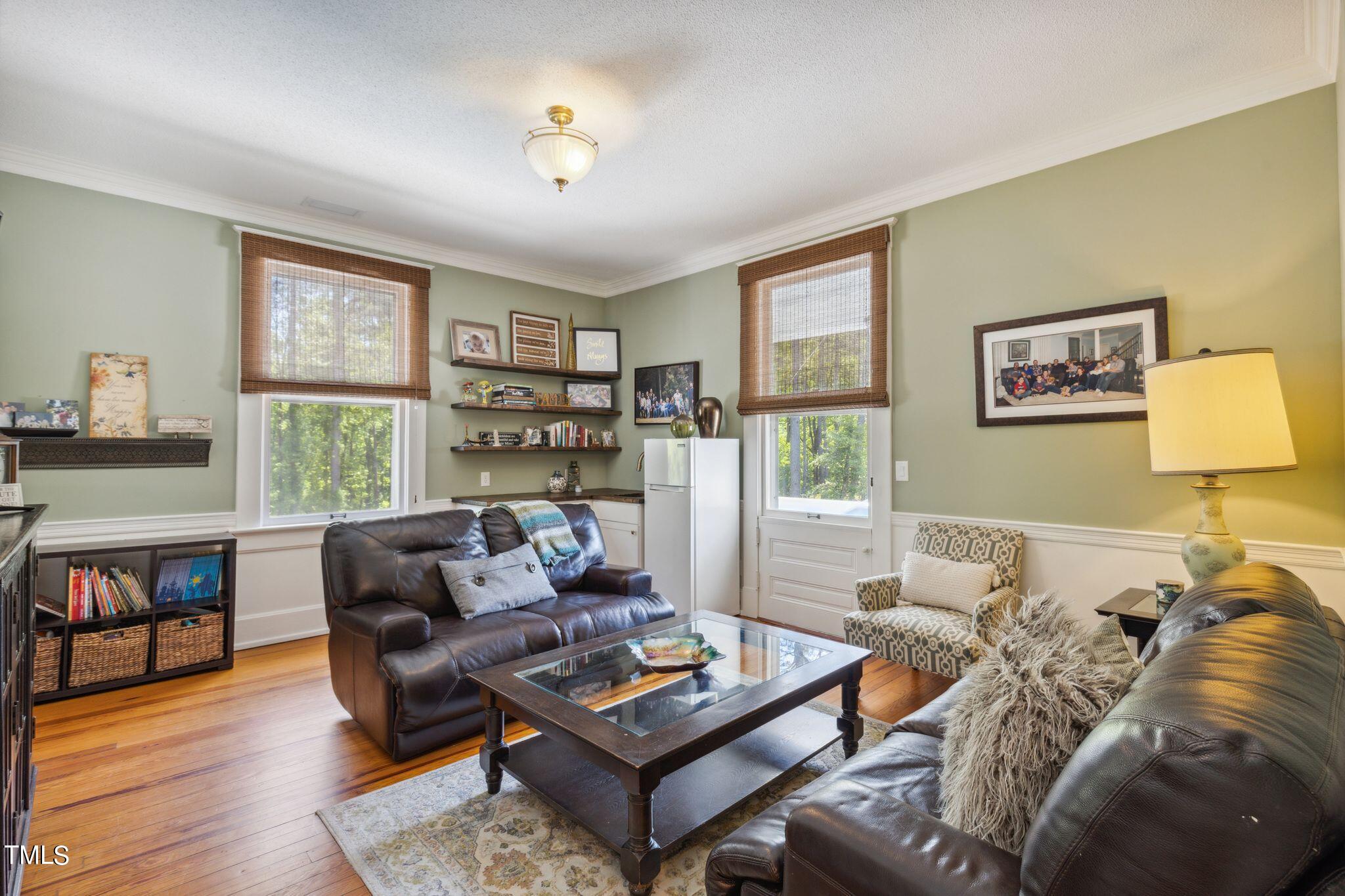 6321 Johnson Pond Road Fuquay-Varina, NC 27526 - Photo 31 of 50 a living room with furniture and a window