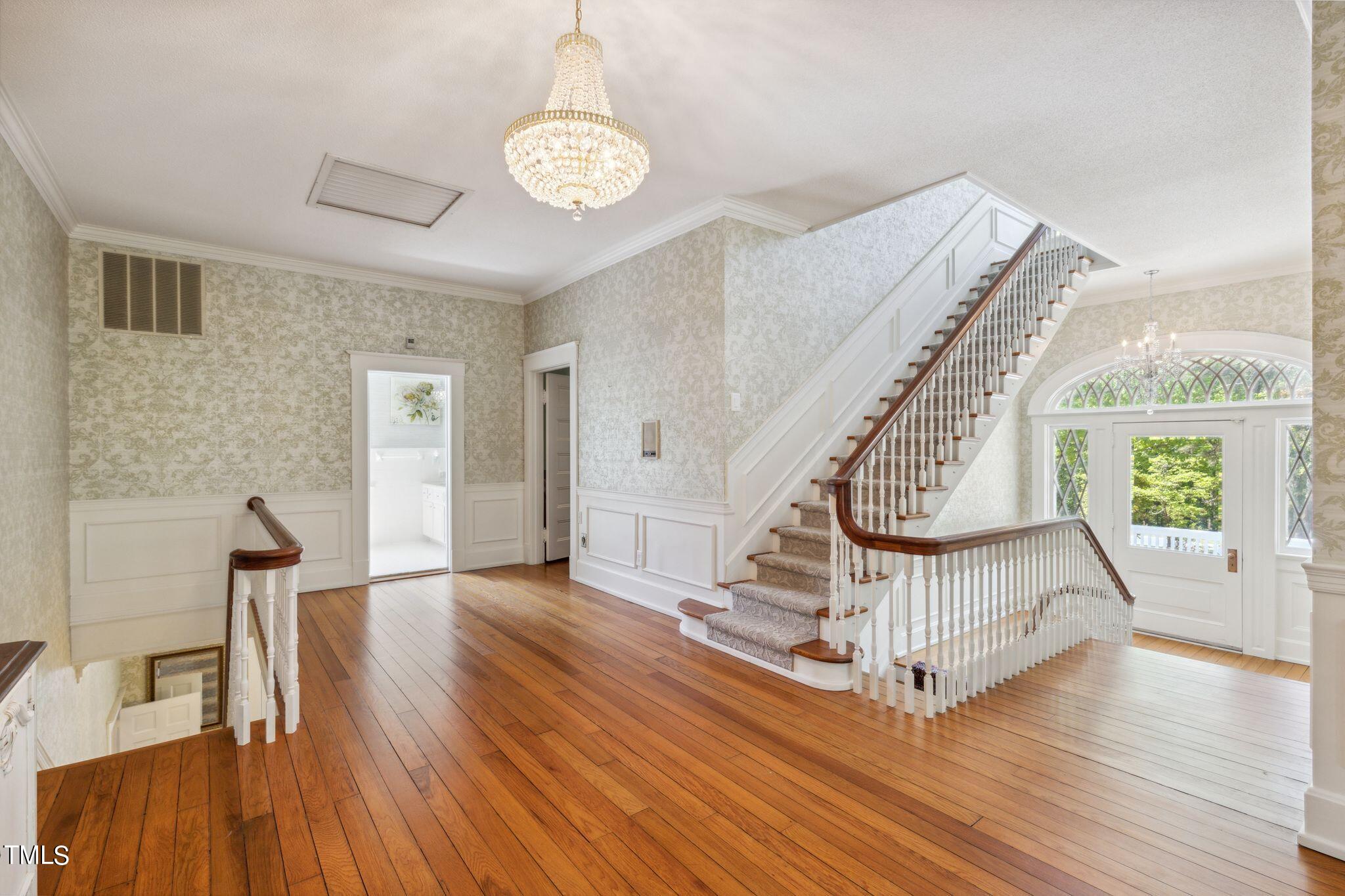 6321 Johnson Pond Road Fuquay-Varina, NC 27526 - Photo 36 of 50 a view of entryway with wooden floor