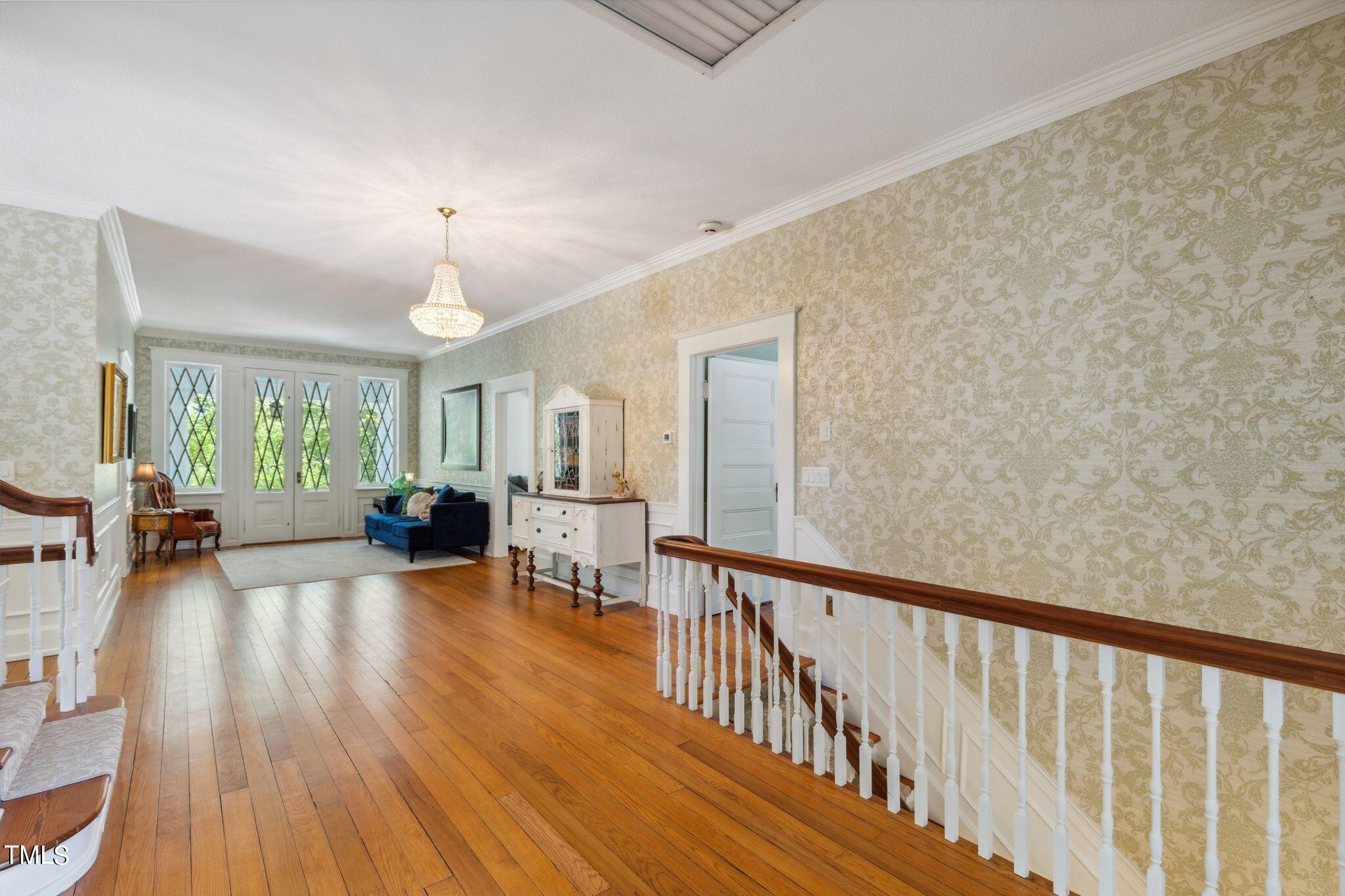 6321 Johnson Pond Road Fuquay-Varina, NC 27526 - Photo 37 of 50 a view of a livingroom with wooden floor and furniture