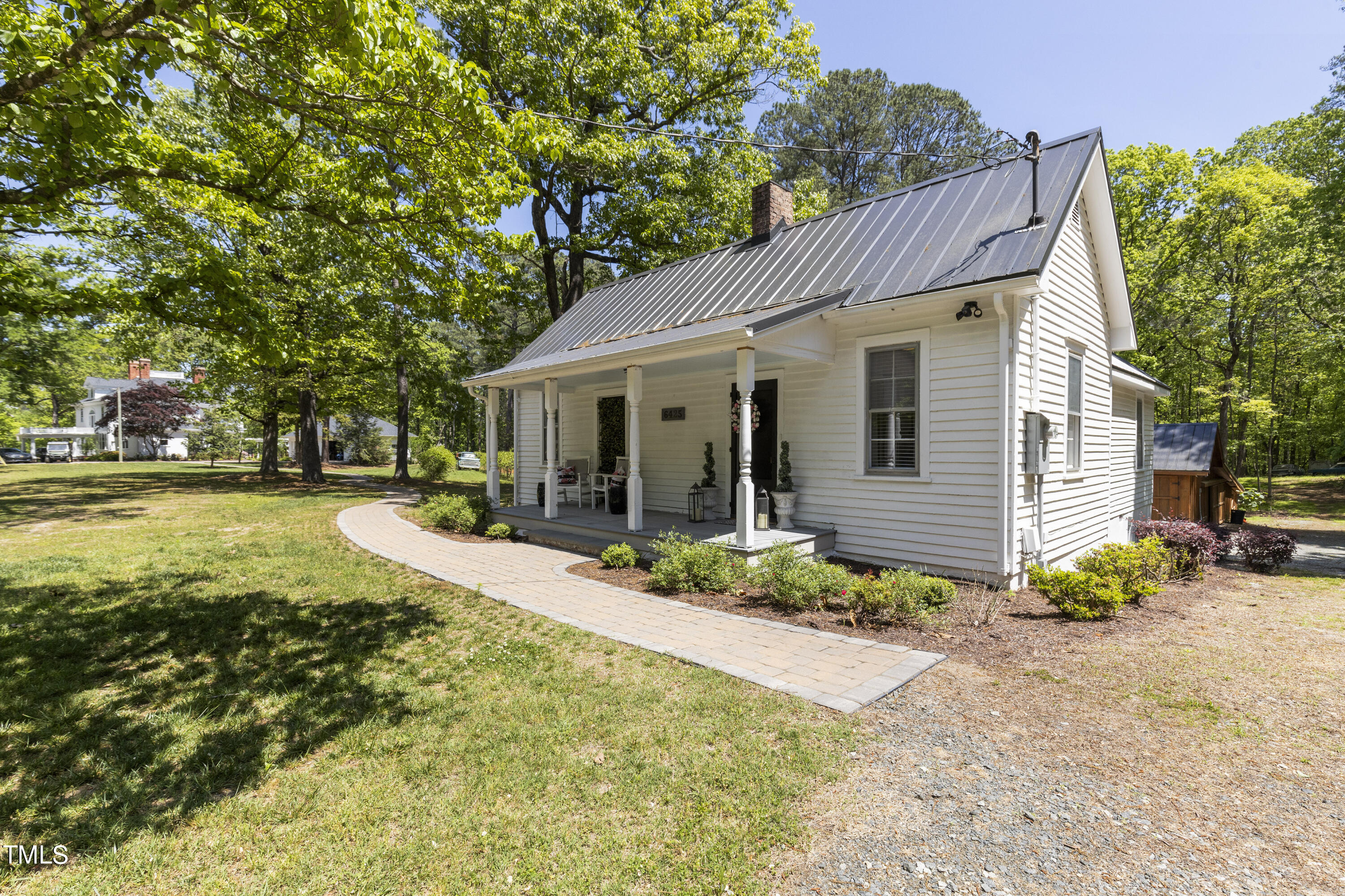 6321 Johnson Pond Road Fuquay-Varina, NC 27526 - Photo 40 of 50 a view of a house with backyard and sitting area