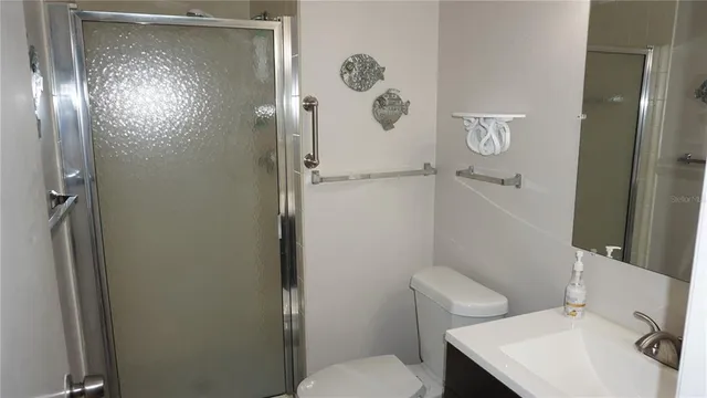 a room with a chair and wooden floor