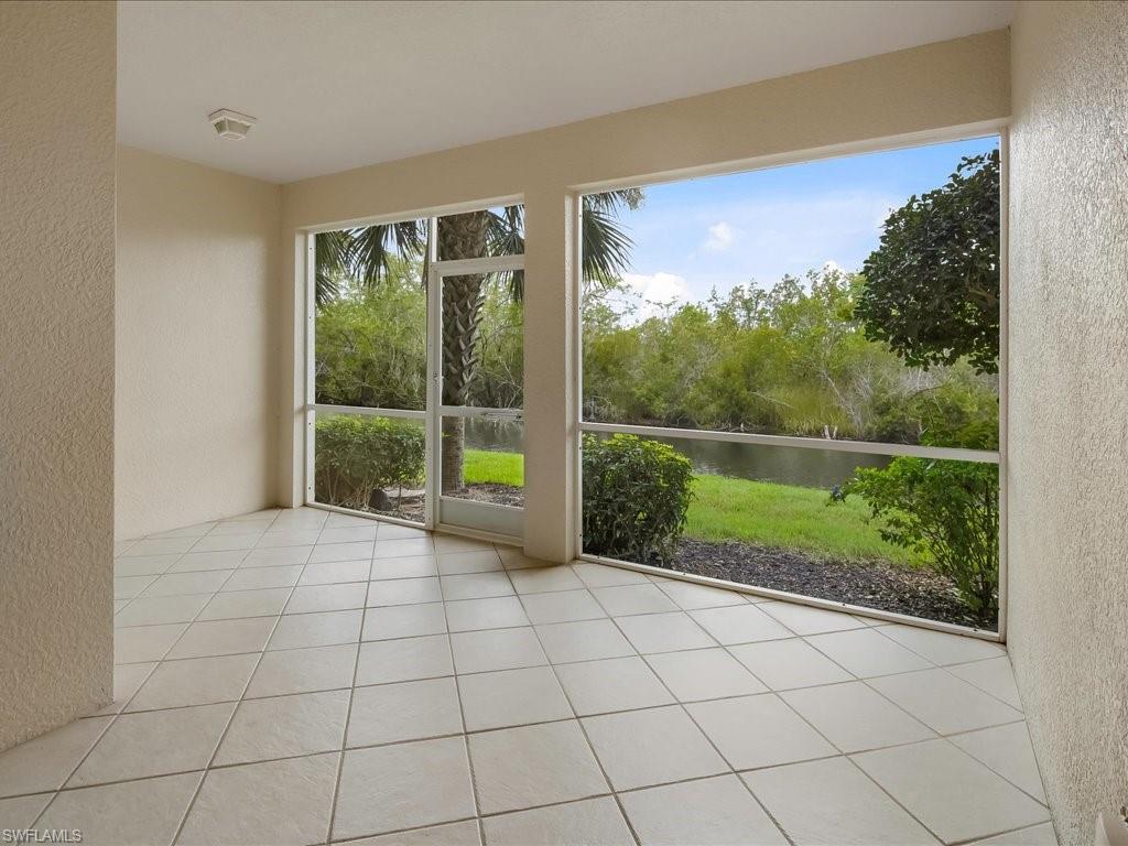 4655 Hawks Nest Way, Unit 103 Naples, FL 34114 - Photo 11 of 33 a view of a room with a large window