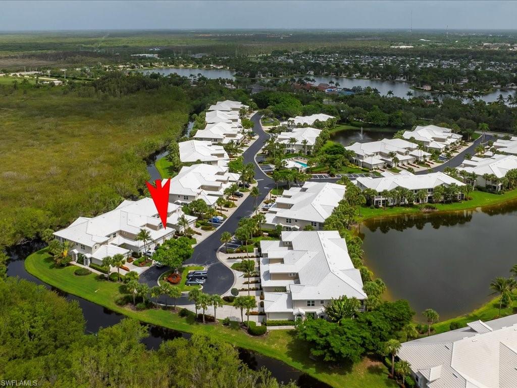 4655 Hawks Nest Way, Unit 103 Naples, FL 34114 - Photo 26 of 33 a picture of city view with lake view and mountain view