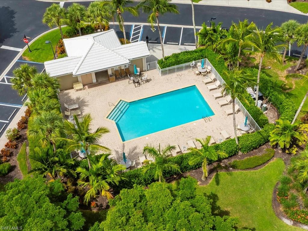 4655 Hawks Nest Way, Unit 103 Naples, FL 34114 - Photo 28 of 33 an aerial view of residential house with outdoor space and swimming pool