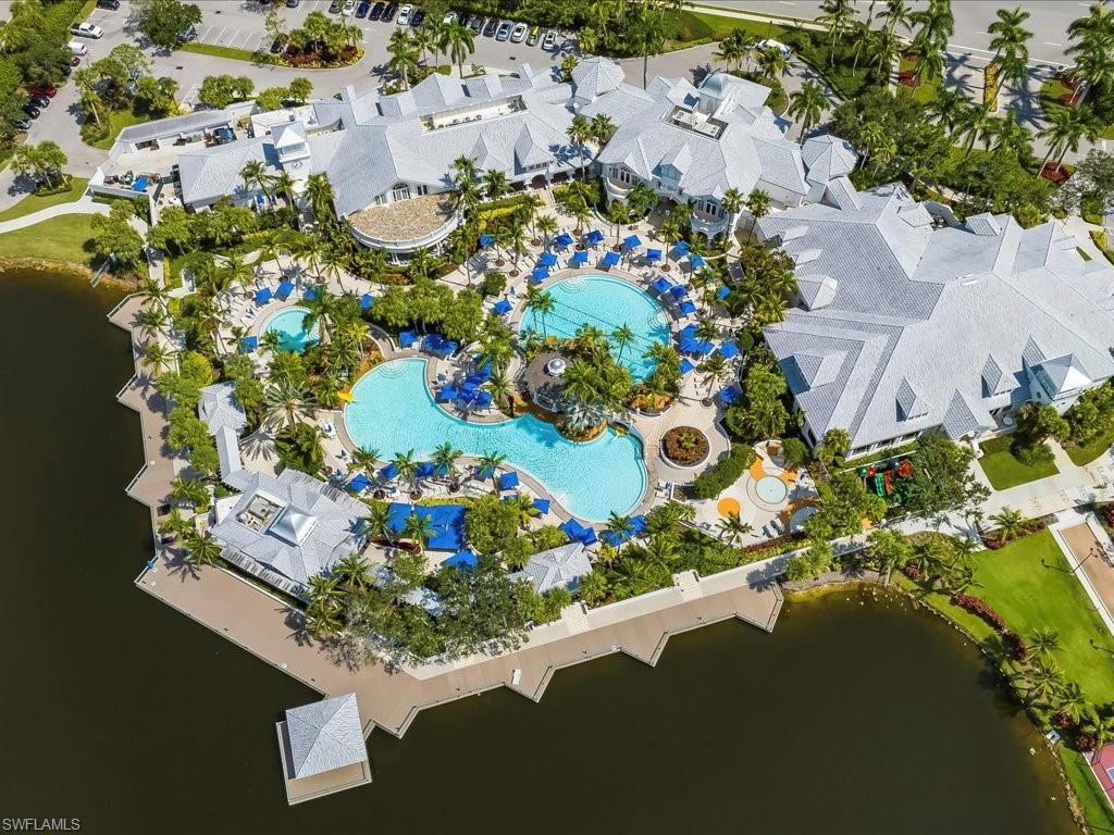 4655 Hawks Nest Way, Unit 103 Naples, FL 34114 - Photo 29 of 33 an aerial view of a residential houses with outdoor space