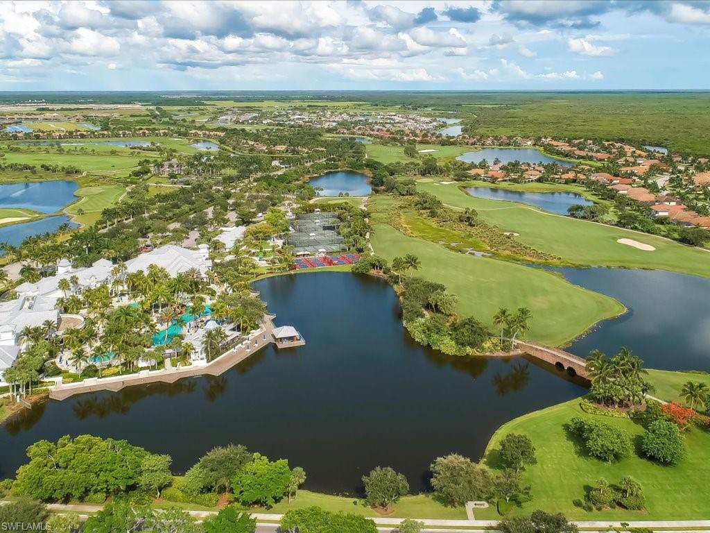 4655 Hawks Nest Way, Unit 103 Naples, FL 34114 - Photo 32 of 33 an aerial view of ocean building and mountain view