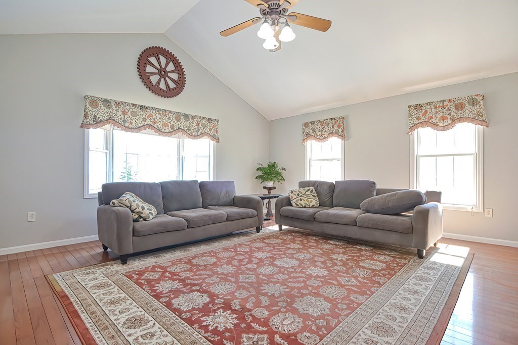 47 Hidden Road Dracut, MA 01826 - Photo 12 of 28 a living room with furniture and a window
