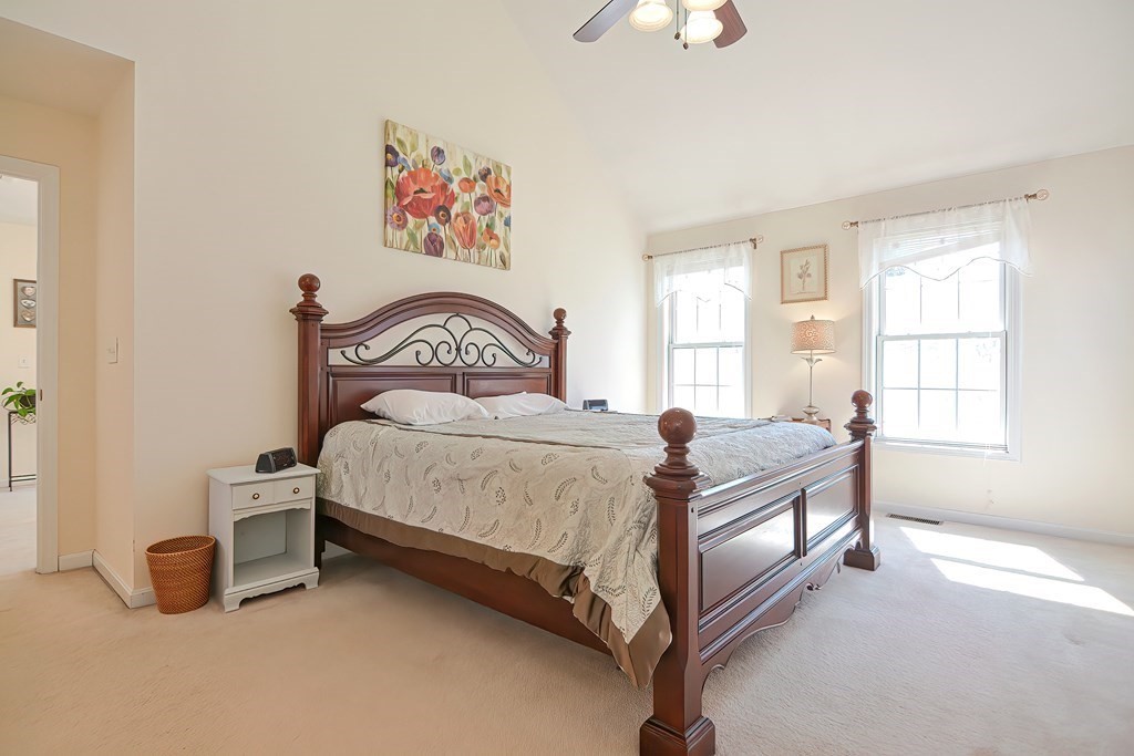 47 Hidden Road Dracut, MA 01826 - Photo 18 of 28 a bedroom with a bed and a window