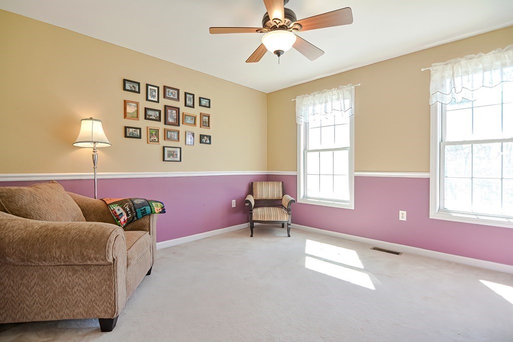 47 Hidden Road Dracut, MA 01826 - Photo 20 of 28 a living room with furniture and window