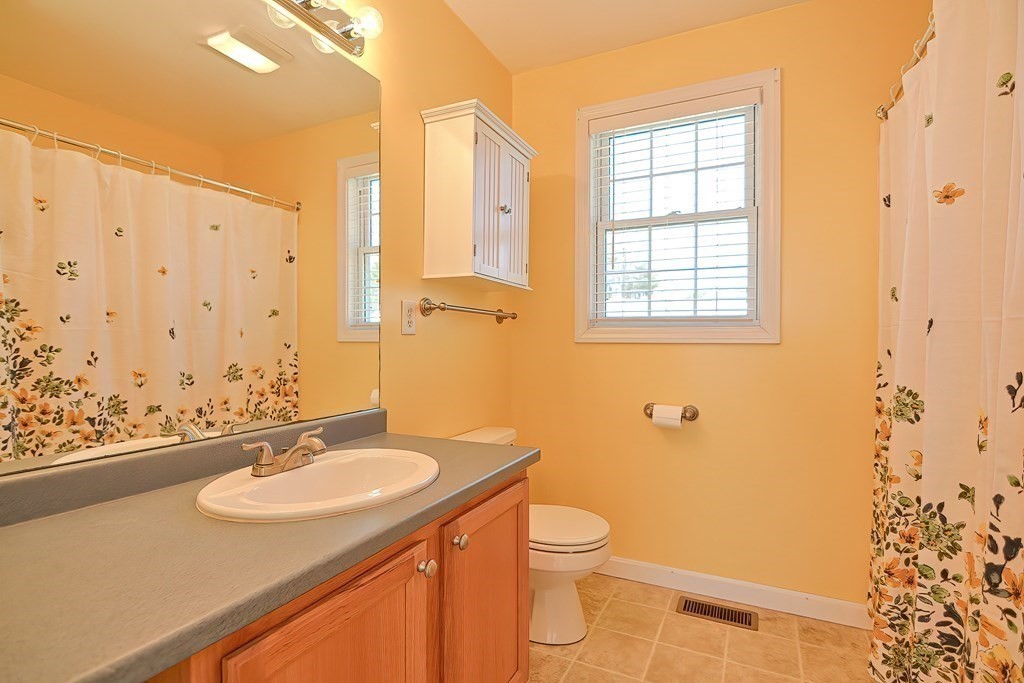 47 Hidden Road Dracut, MA 01826 - Photo 24 of 28 a bathroom with a sink toilet and shower