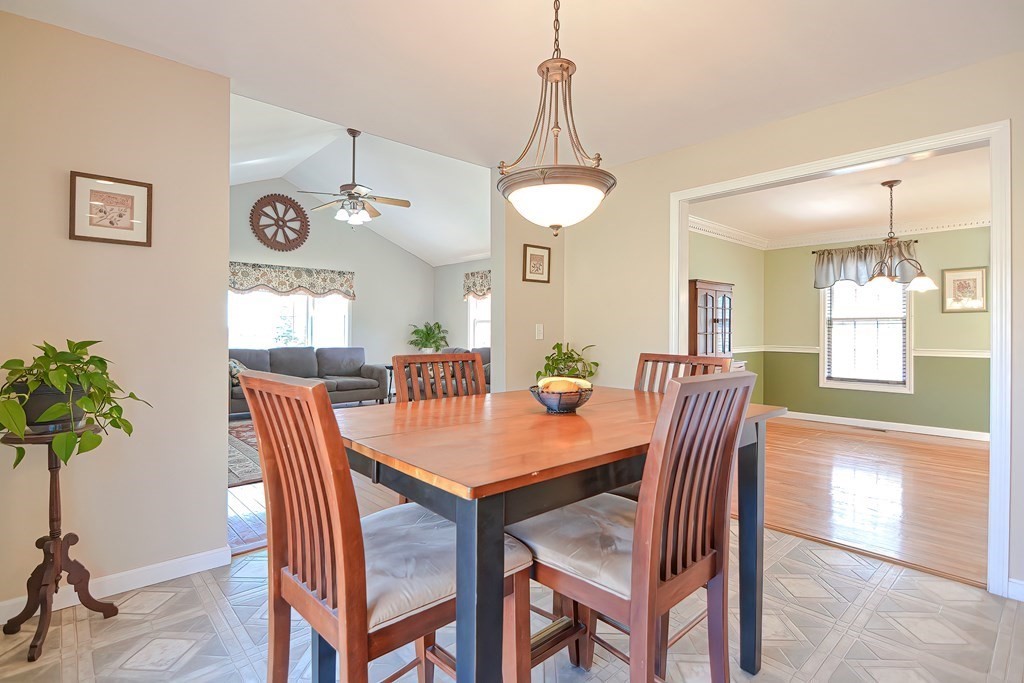 47 Hidden Road Dracut, MA 01826 - Photo 8 of 28 a view of a dining room and a table or chairs