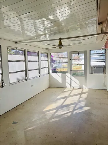 a view of a livingroom with a large window