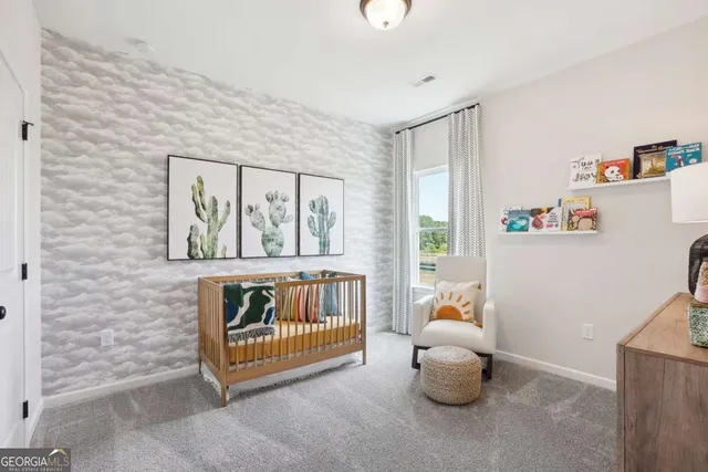 a bedroom with furniture and a window