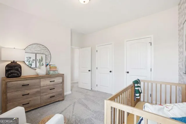 a bathroom with a sink toilet a mirror and shower