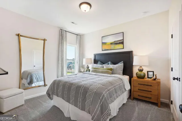 a bedroom with a toilet and a shower