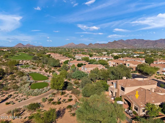 an aerial view of residential house with outdoor space
