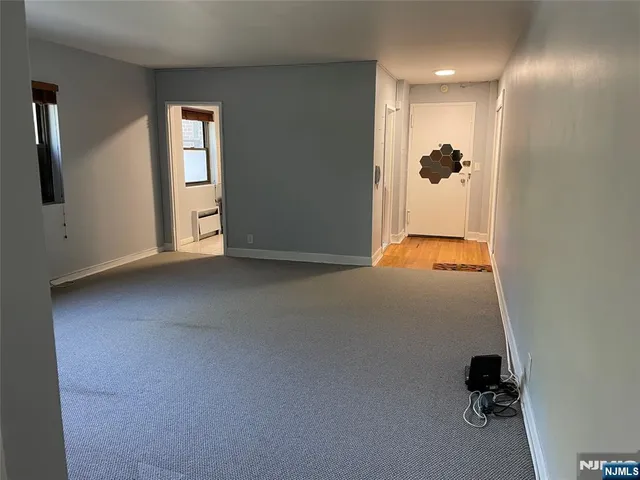 a view of empty room with a window