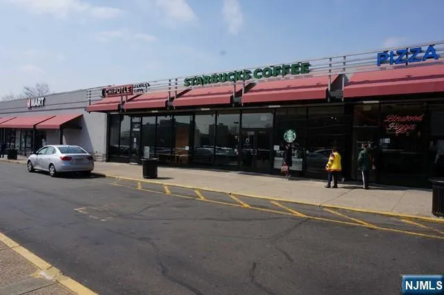 a white bath tub sitting next to a white sink