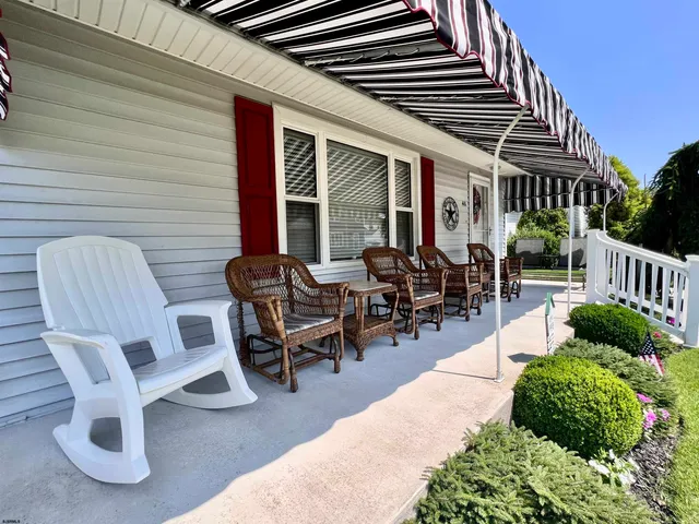 a building outdoor space with patio furniture