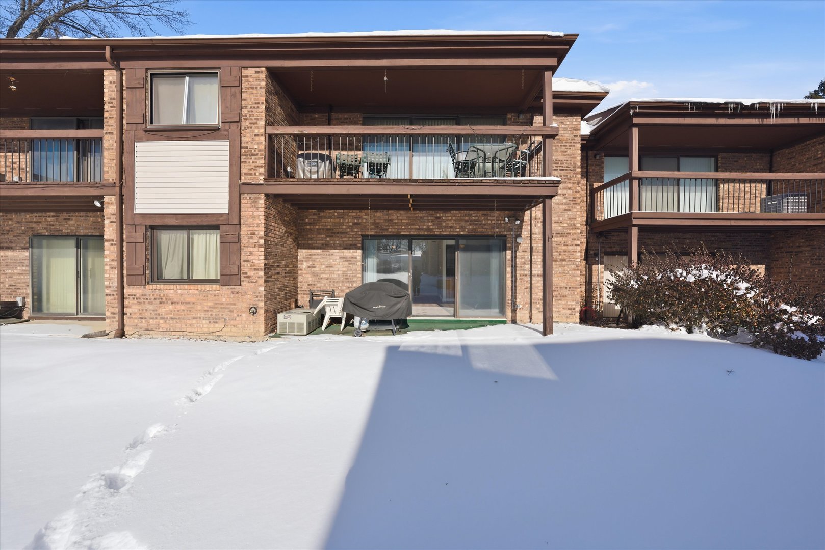 3207 West 184th Street, Unit 1A Homewood, IL 60430 - Photo 2 of 16 a view of a house with a patio