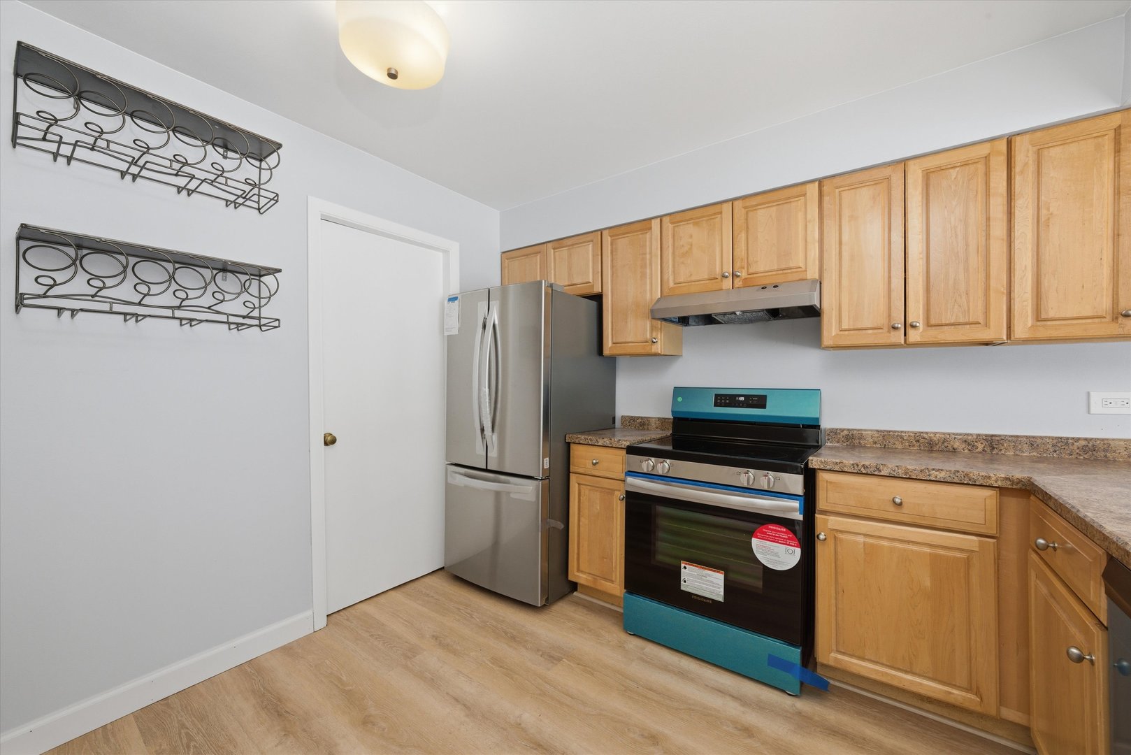 3207 West 184th Street, Unit 1A Homewood, IL 60430 - Photo 7 of 16 a kitchen with a refrigerator sink and cabinets
