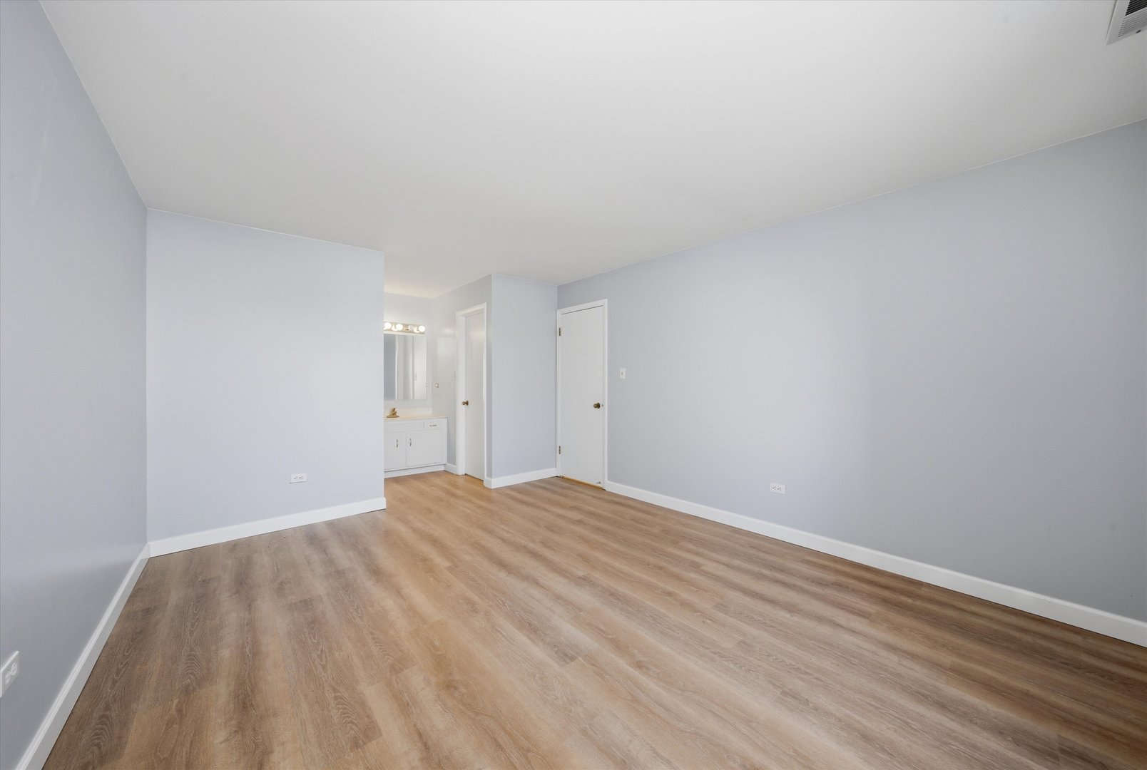 3207 West 184th Street, Unit 1A Homewood, IL 60430 - Photo 8 of 16 a view of empty room with wooden floor