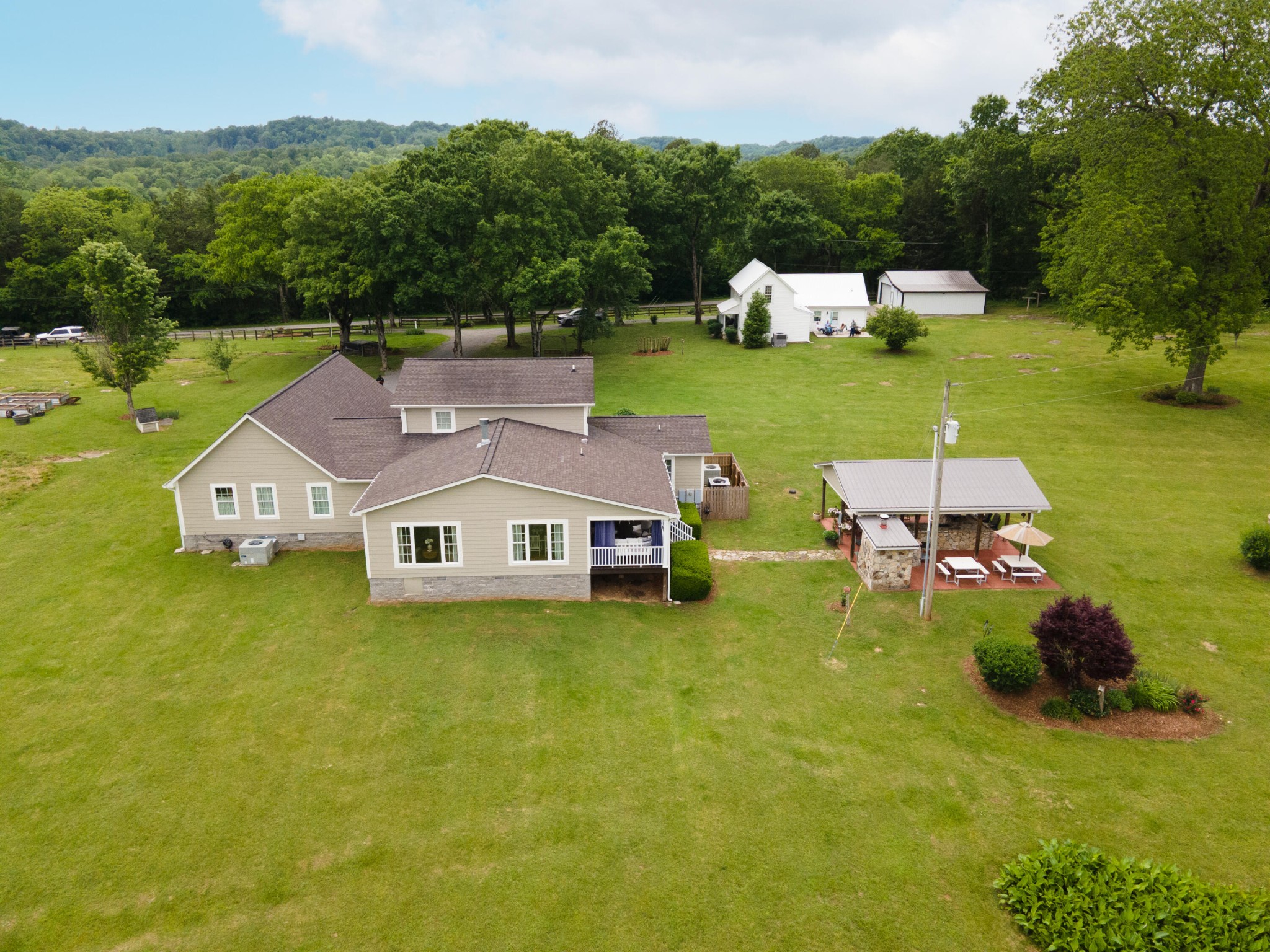 29 Roger Monk Road Petersburg, TN 37144 - Photo 5 of 94 an aerial view of a house with swimming pool garden and mountain view