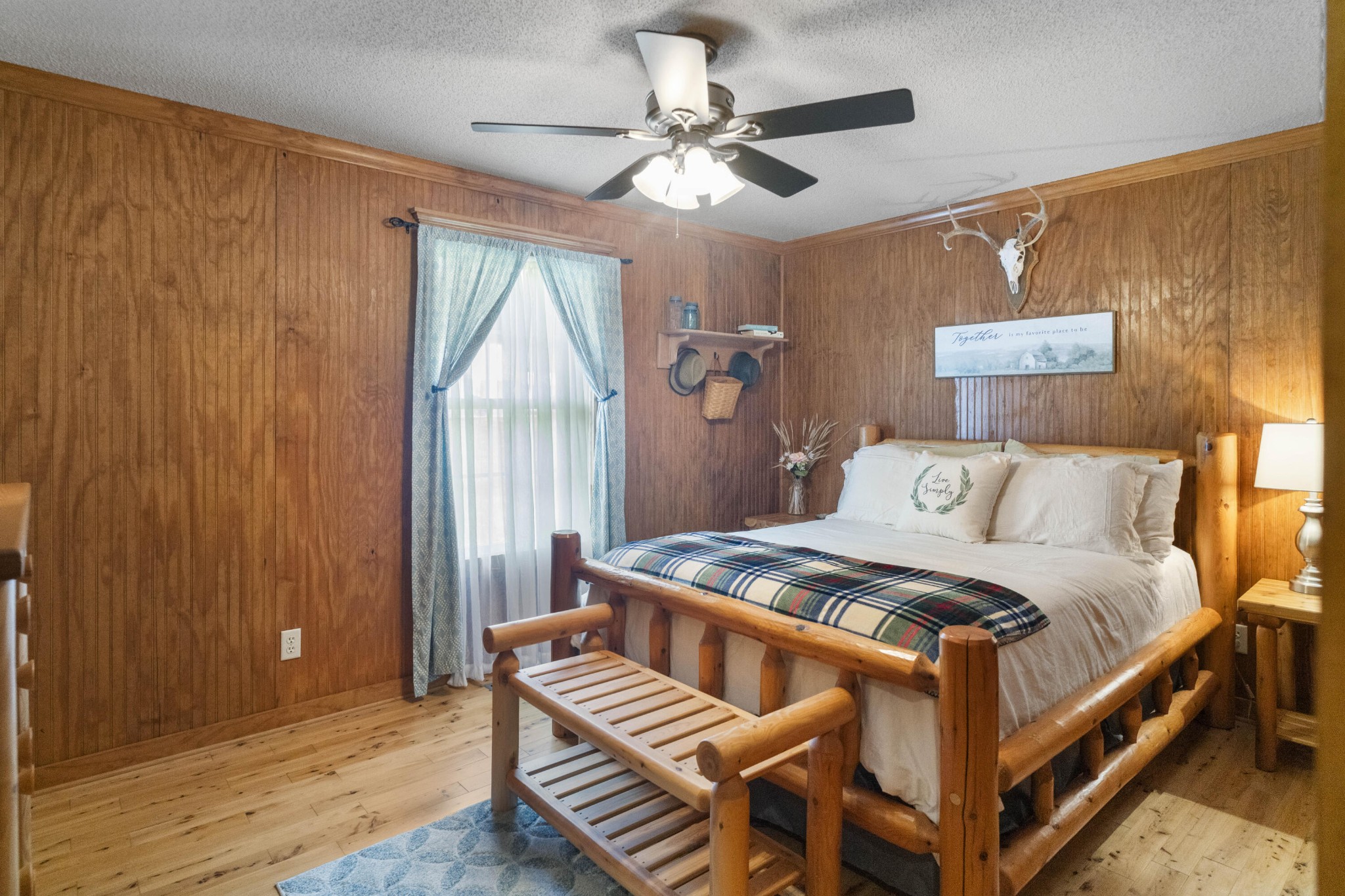 29 Roger Monk Road Petersburg, TN 37144 - Photo 54 of 94 a bedroom with a bed and a chandelier