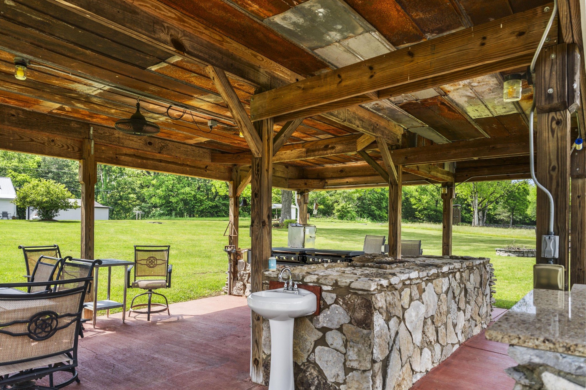 29 Roger Monk Road Petersburg, TN 37144 - Photo 67 of 94 a view of a patio with a table chairs and a backyard