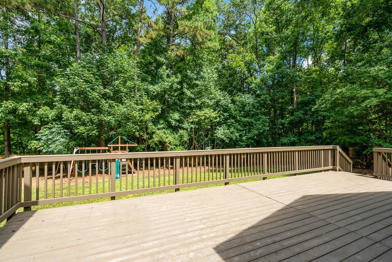 1309 Taylor Farm Road Raleigh, NC 27603 - Photo 29 of 38 Huge deck with newer boards to spruce up your entertaining spaces. Patio/Deck